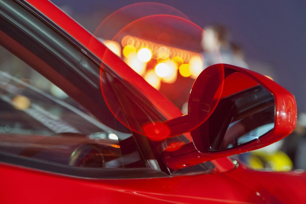 Luxury Car Ferrari being towed by C.A.R Towing Company